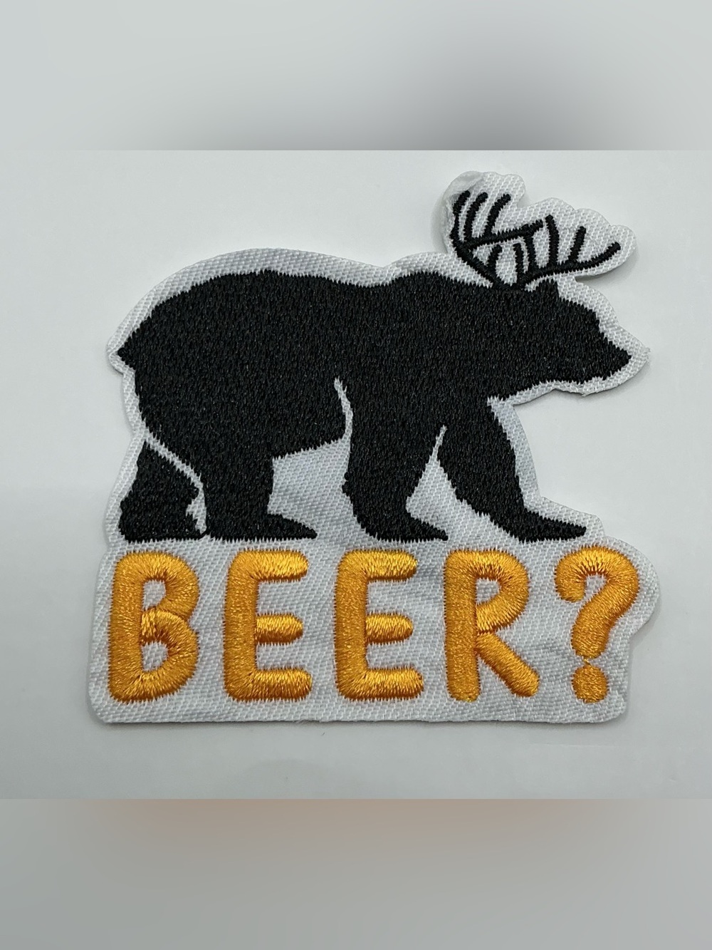 IRON OR SEW ON PATCH BEAR WITH DEER ANTLERS BEER?